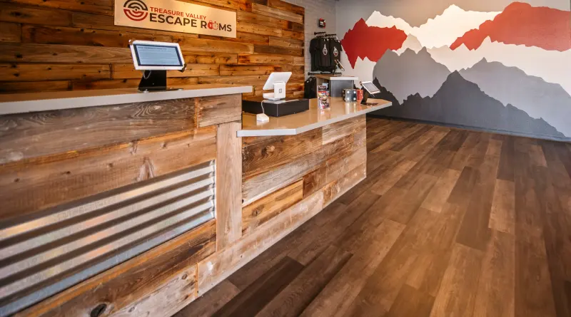 The lobby’s painted mountain mural in red, white and grey